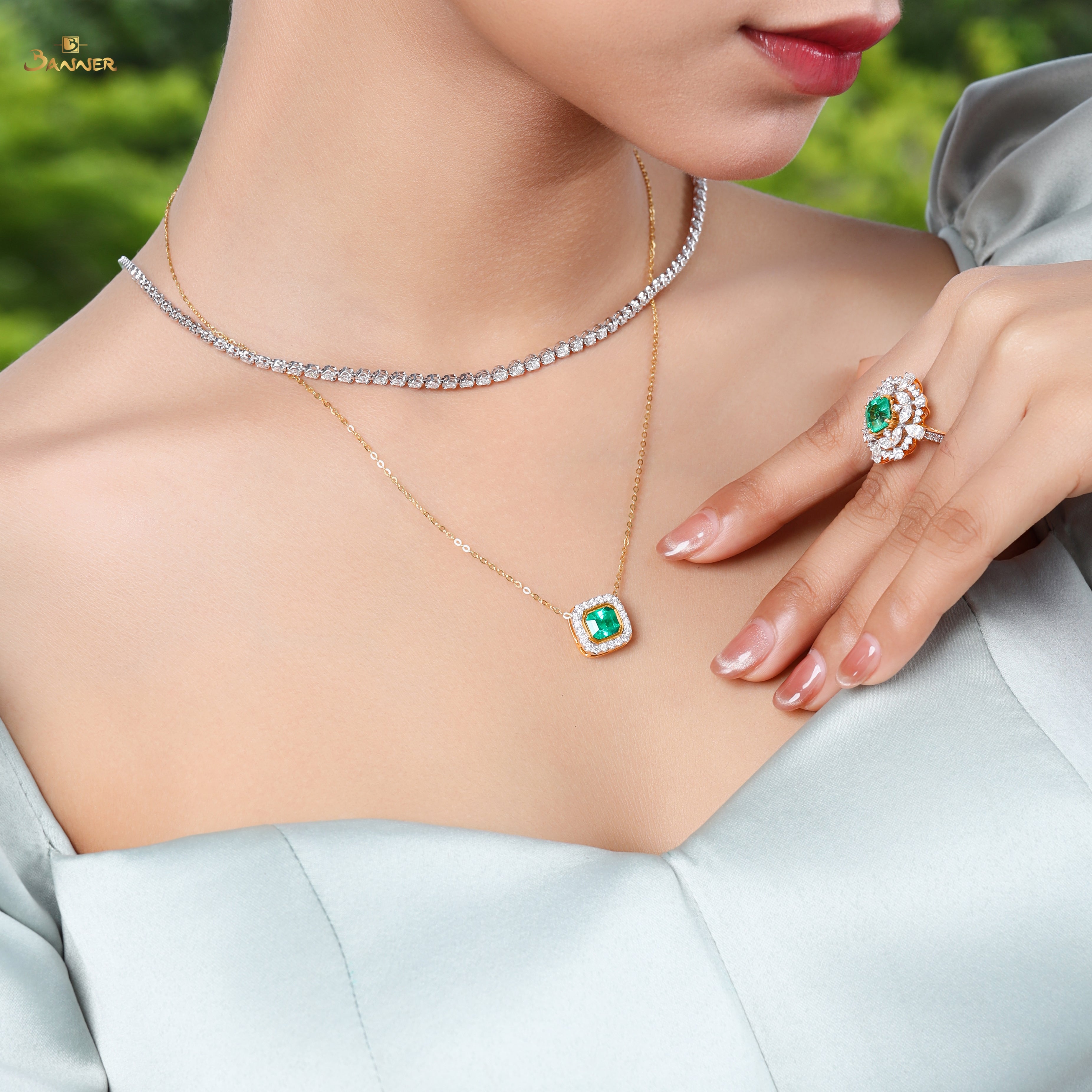 Columbia Emerald and Diamond Halo Pendant
