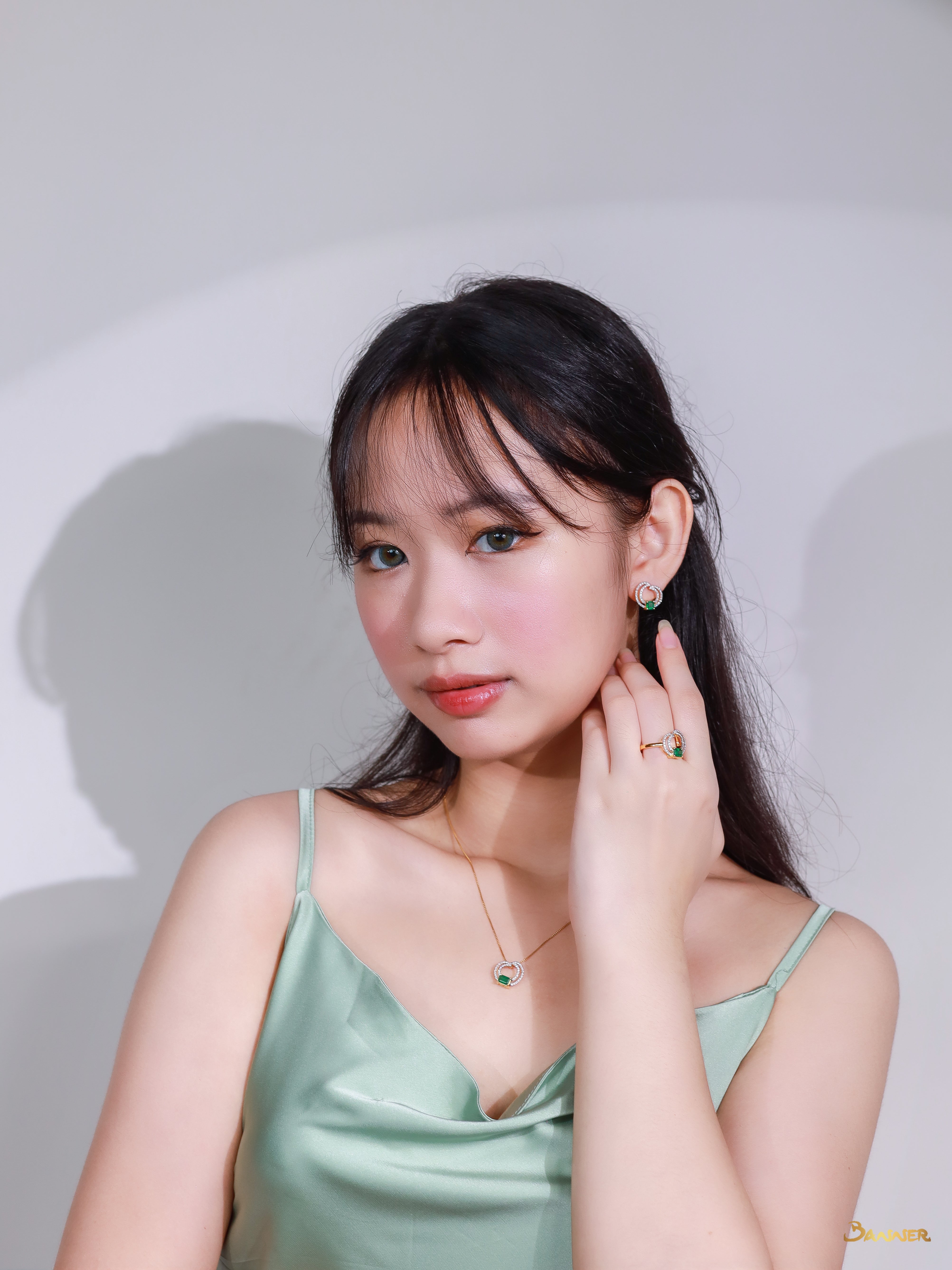 Emerald and Diamond Double Helix Earrings