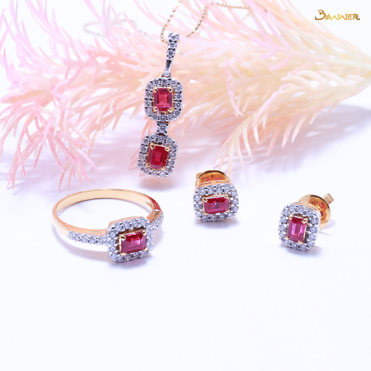 Emerald-cut Rubies and Diamond Halo Set