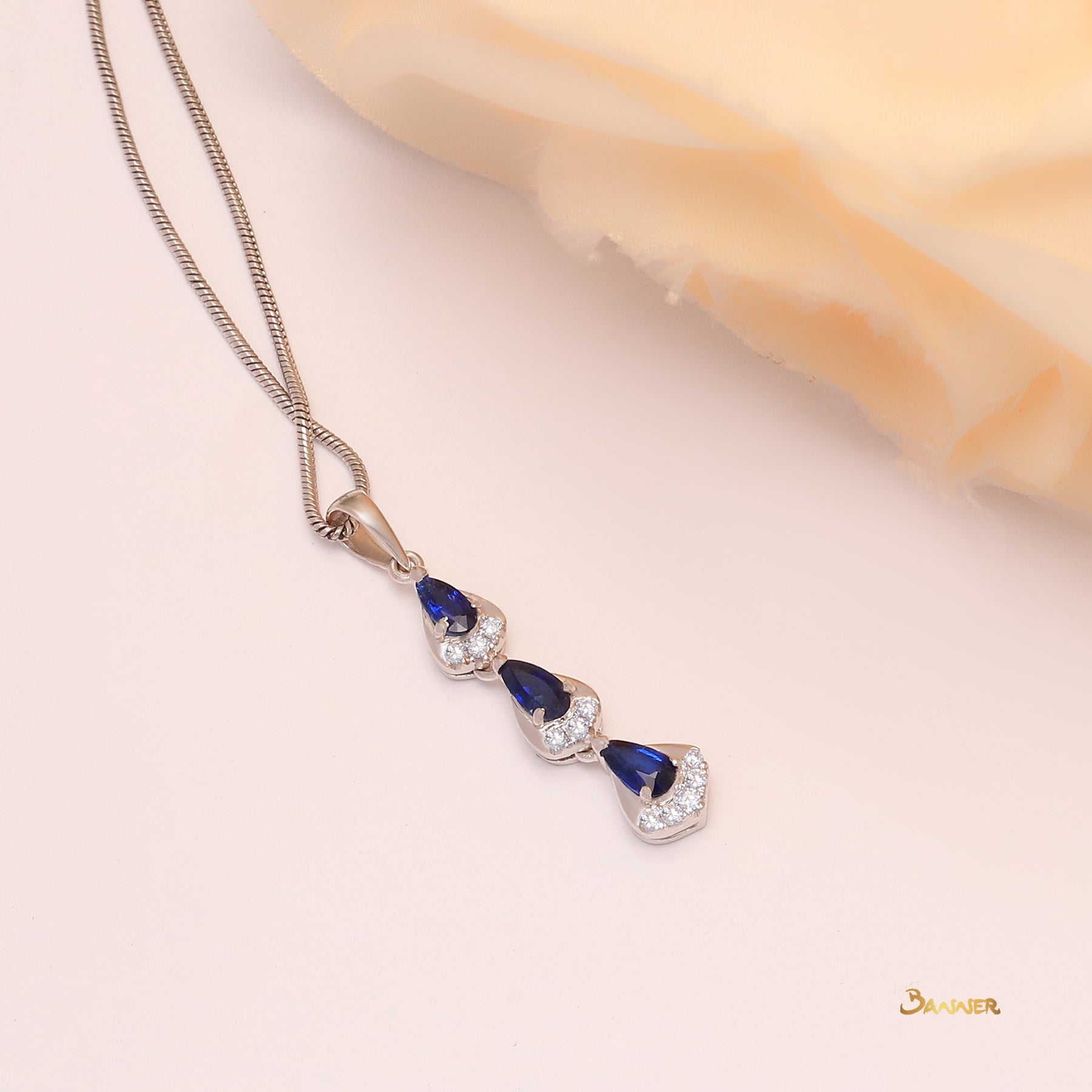 Pear-shaped Sapphire and Diamond 3-step Pendant