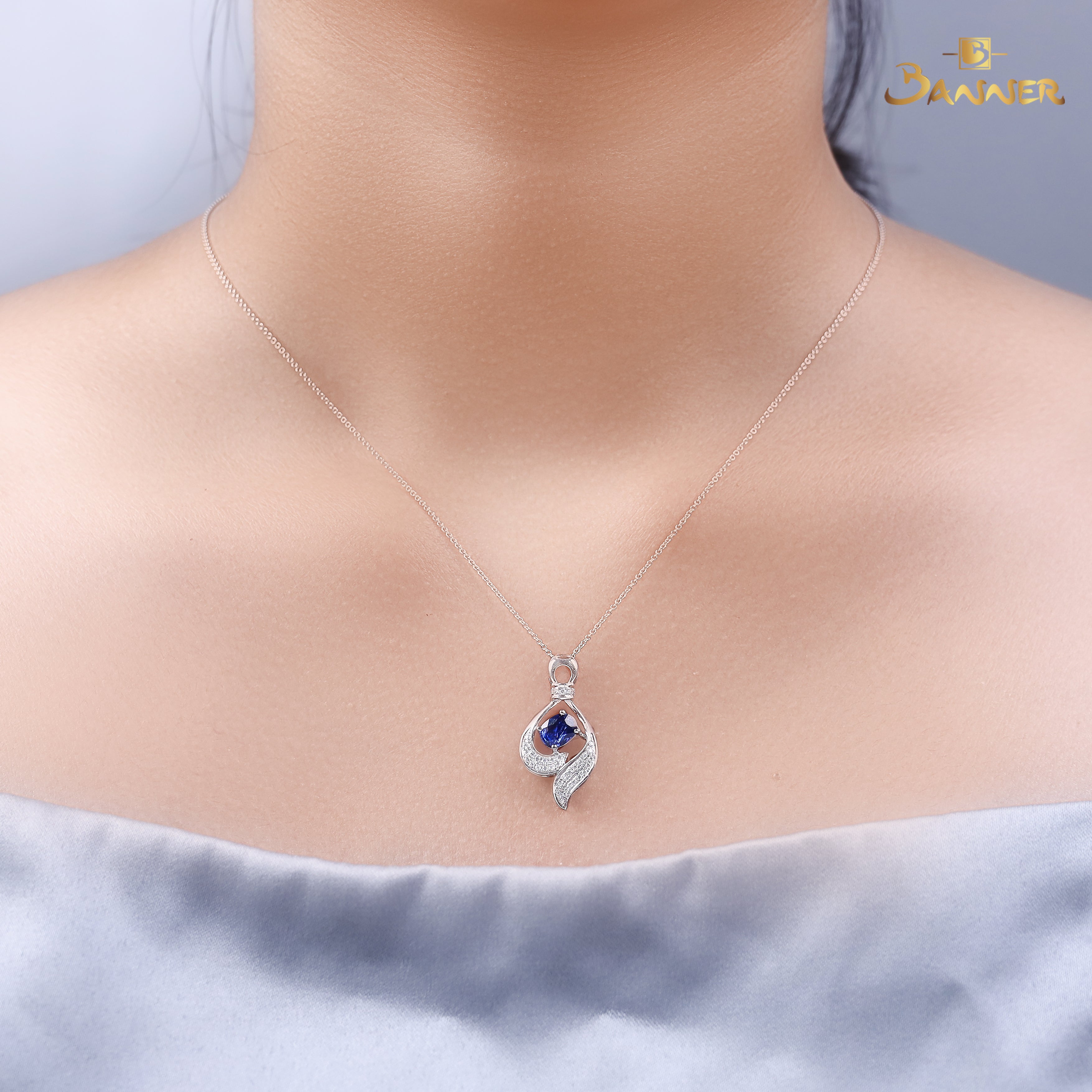 Sapphire and Diamond Infinity Swirl Pendant