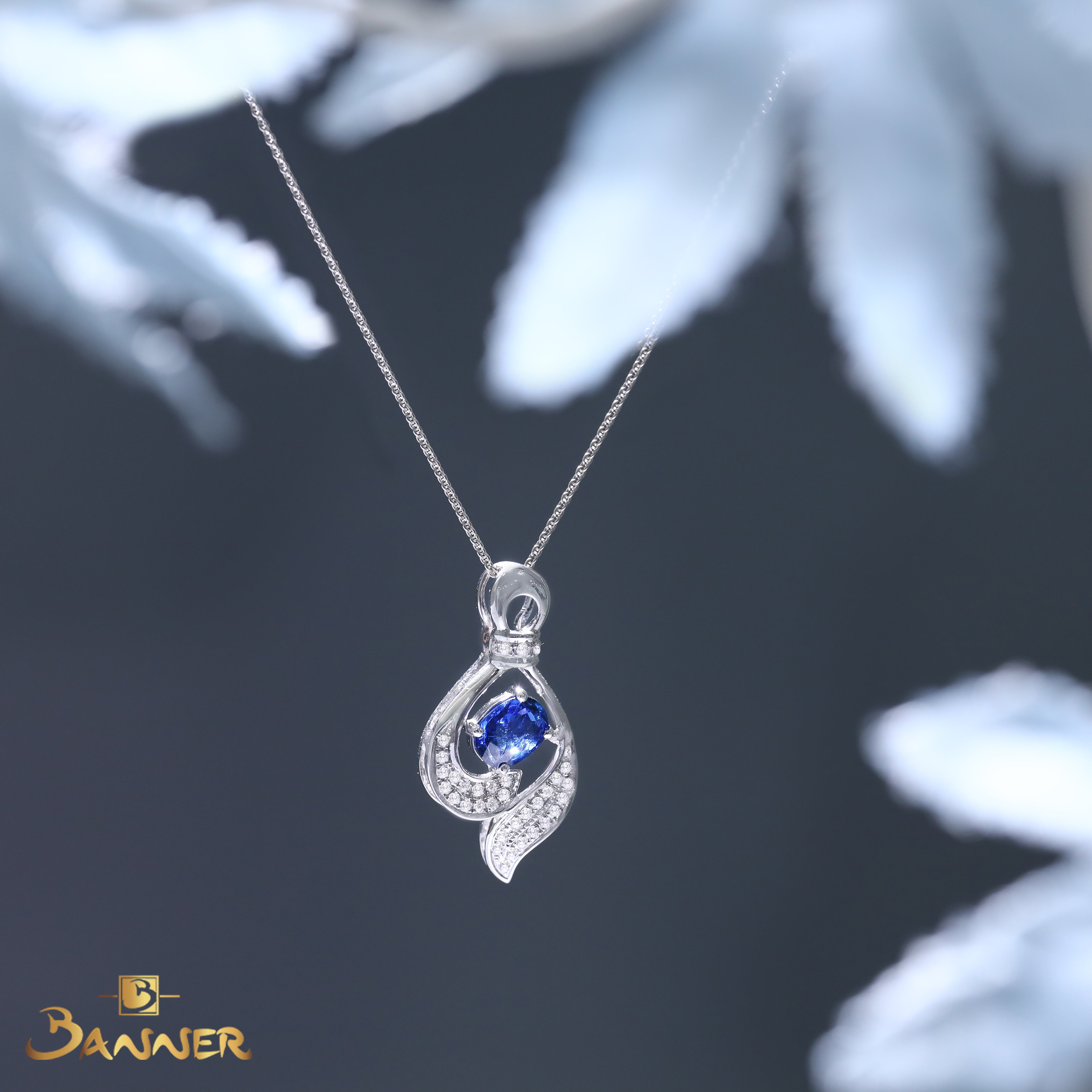Sapphire and Diamond Infinity Swirl Pendant