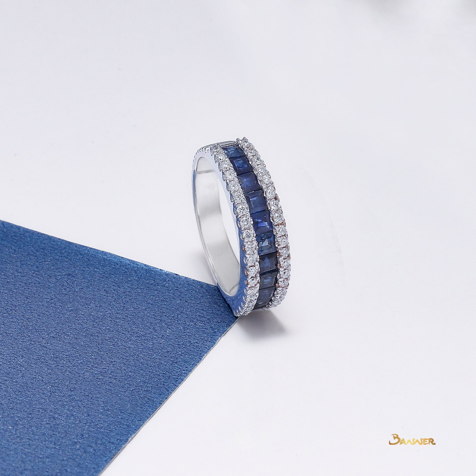 Emerald-cut Sapphires and Diamond Tier Ring