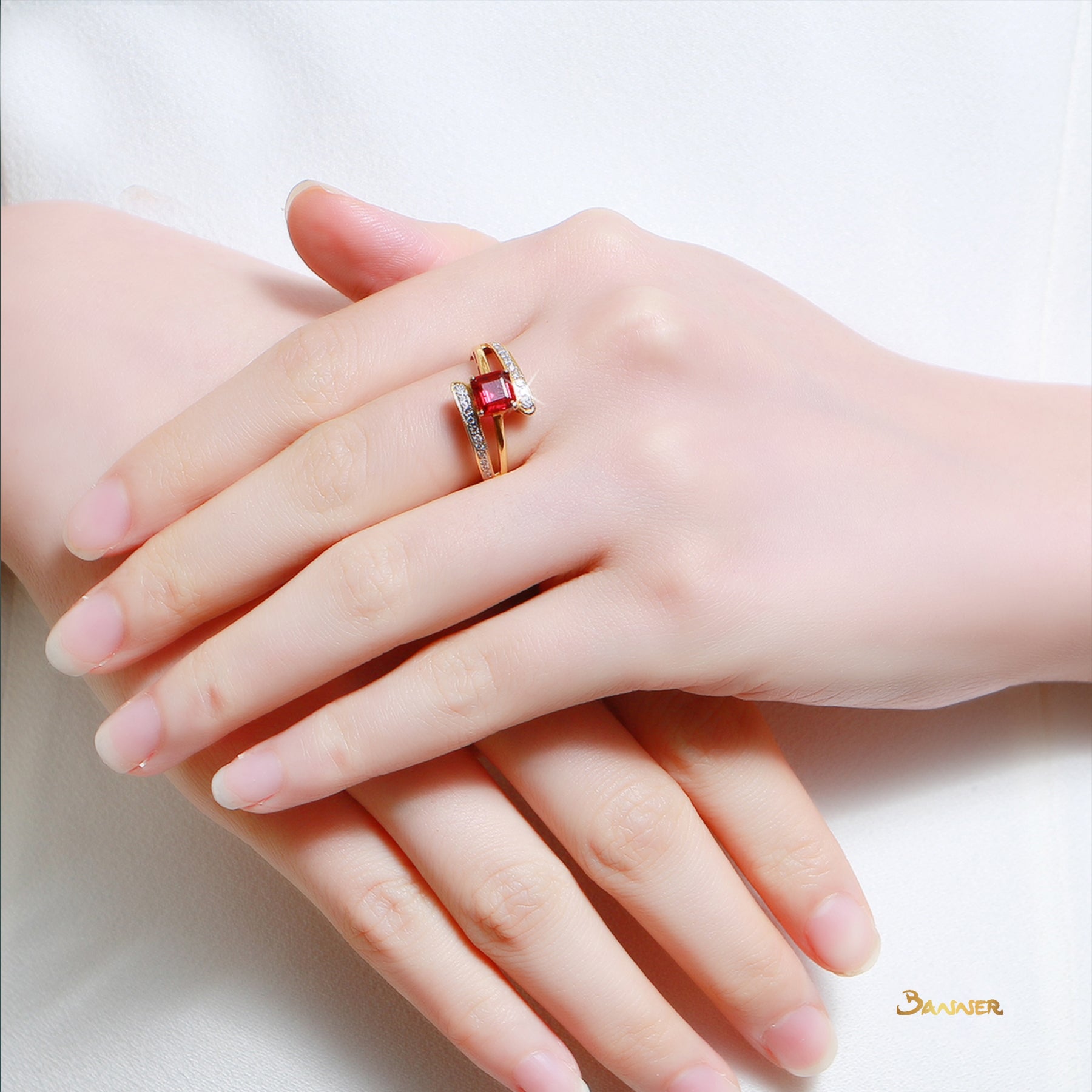 Emerald-cut Spinel and Diamond Bypass Ring