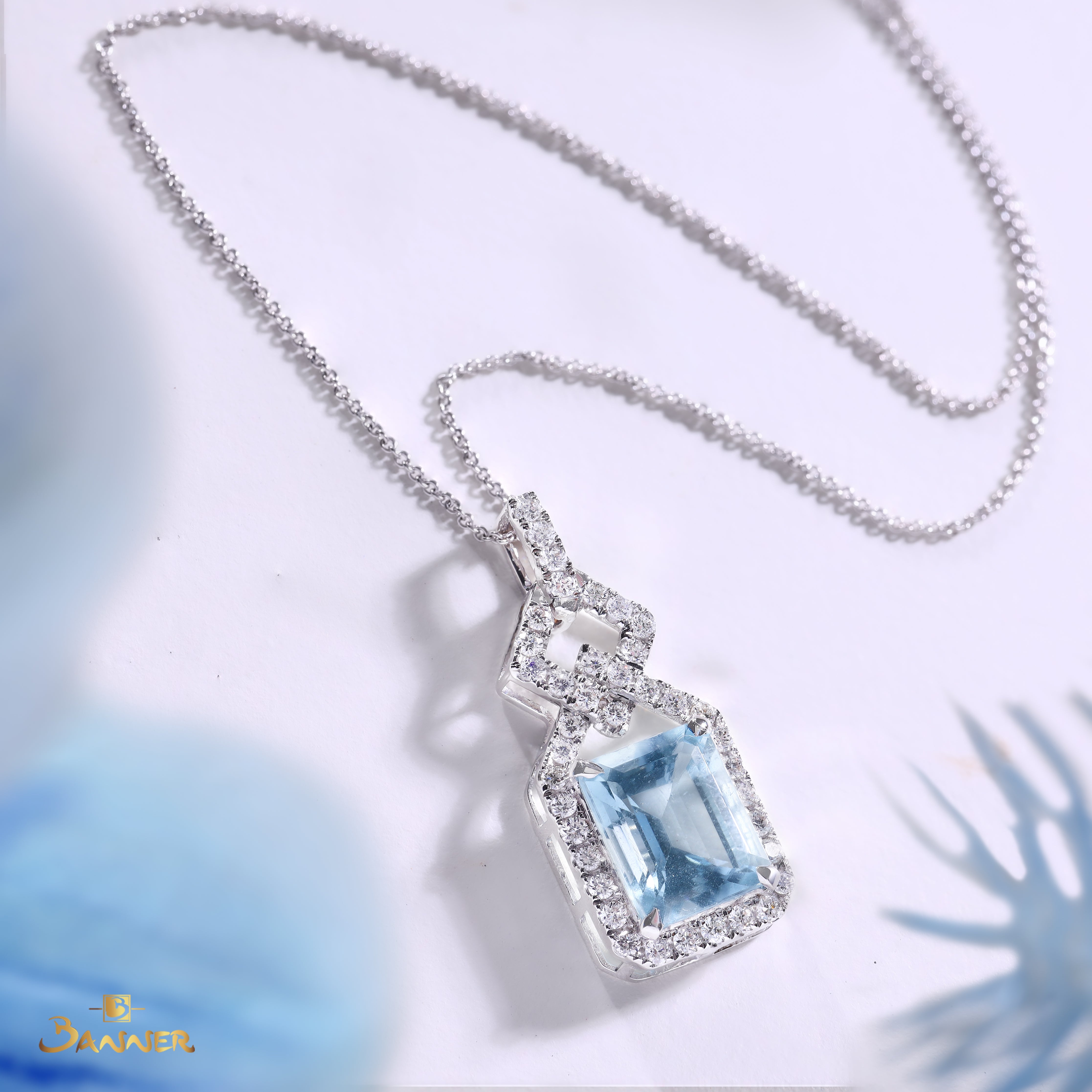 Aquamarine and Diamond Halo Dangle Pendant