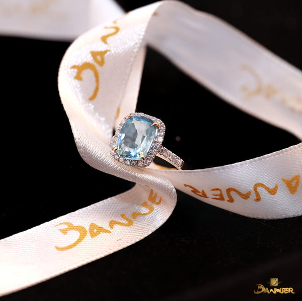 Aquamarine and Diamond Halo Ring