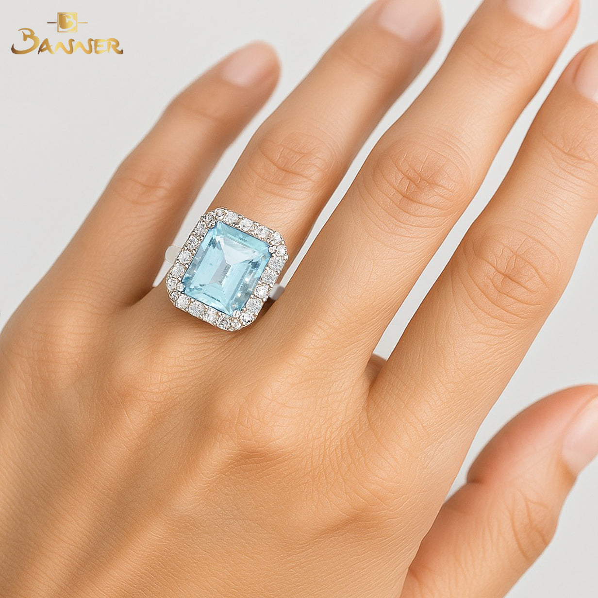 Aquamarine and Diamond Halo Ring