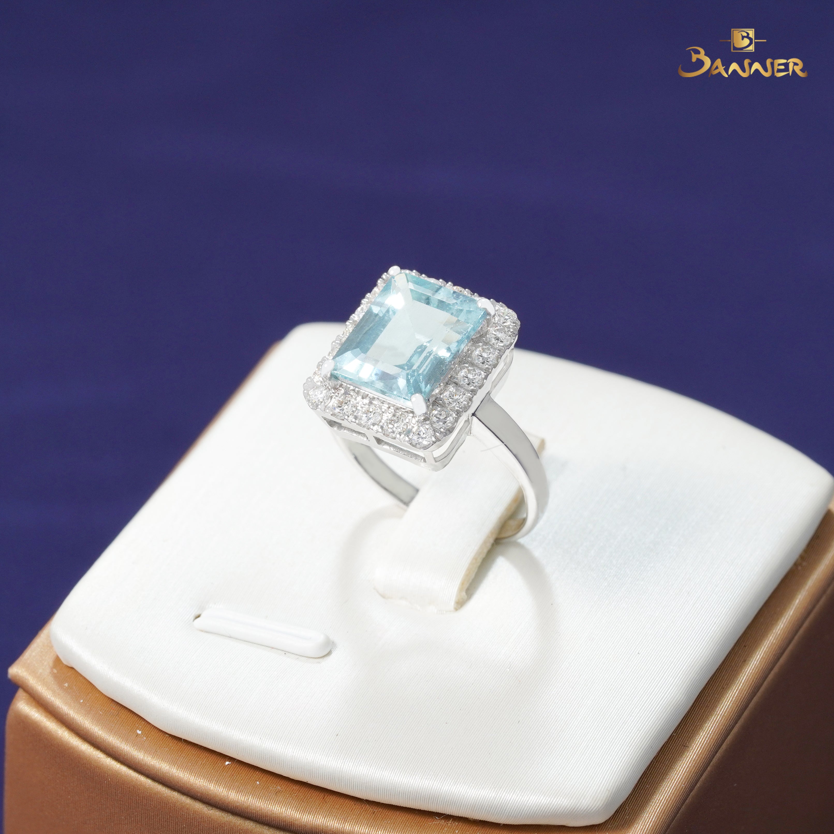 Aquamarine and Diamond Halo Ring