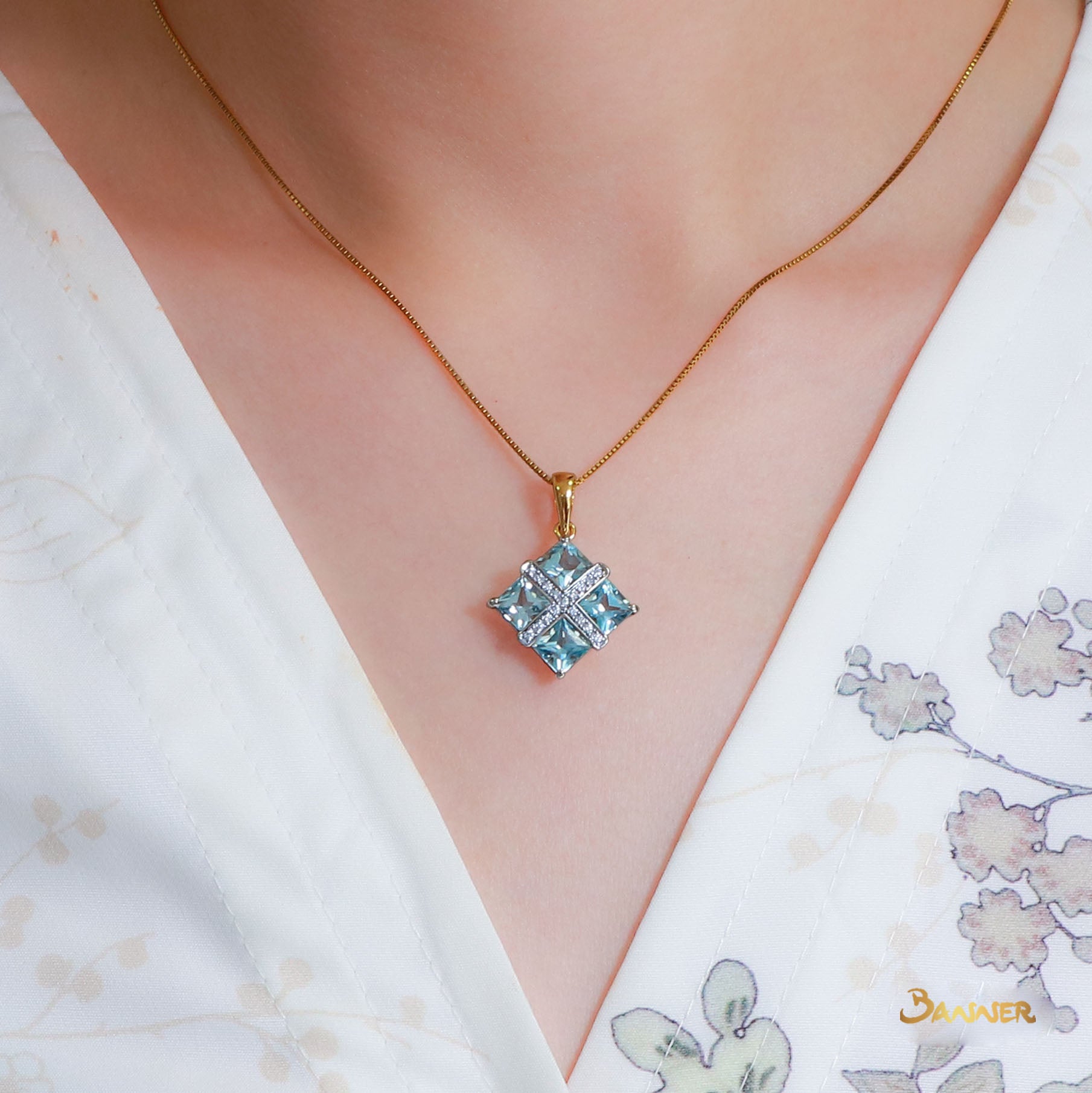 Blue Topaz and Diamond Pendant