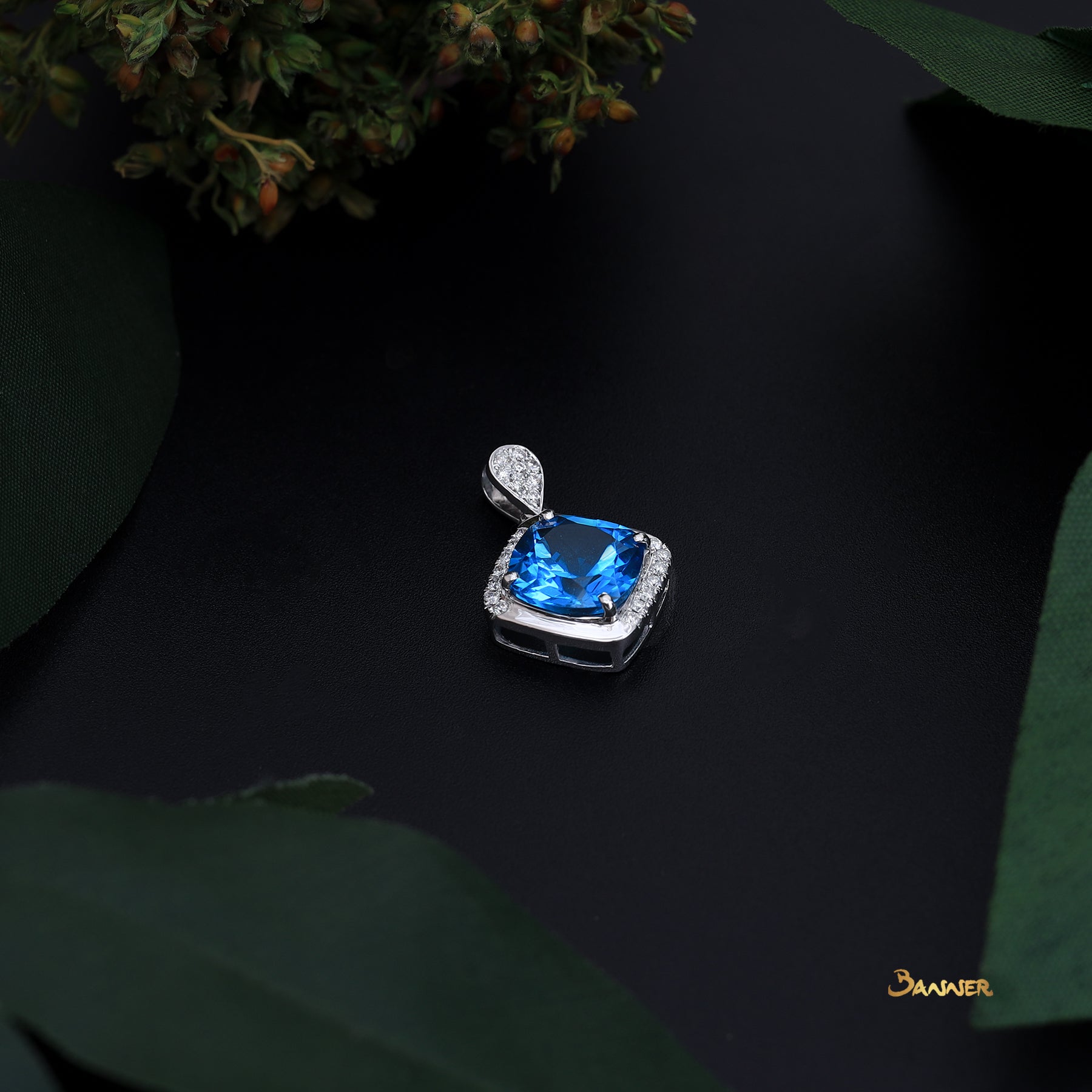 Blue Topaz and Diamond Pendant