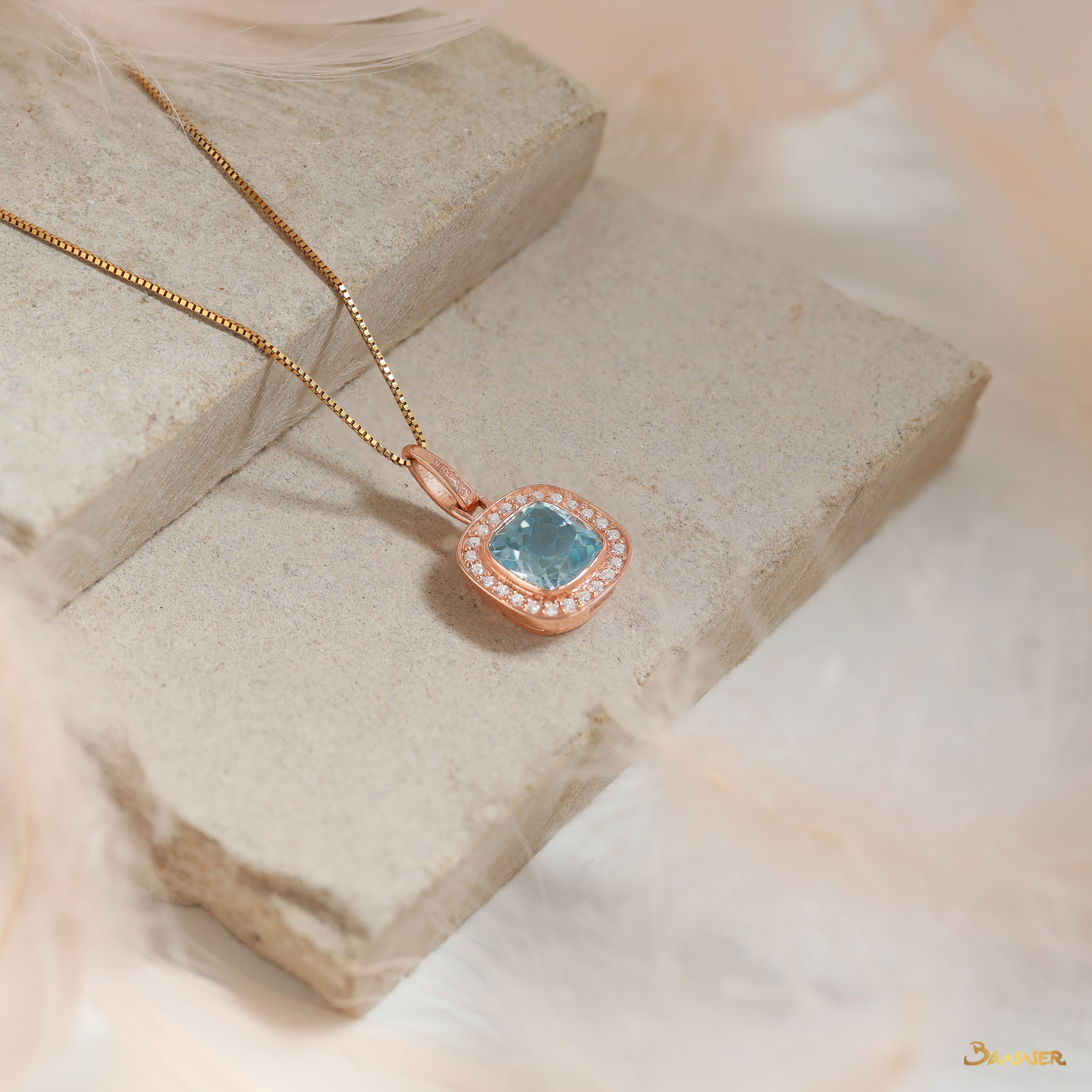 Blue Topaz and Diamond Halo Pendant