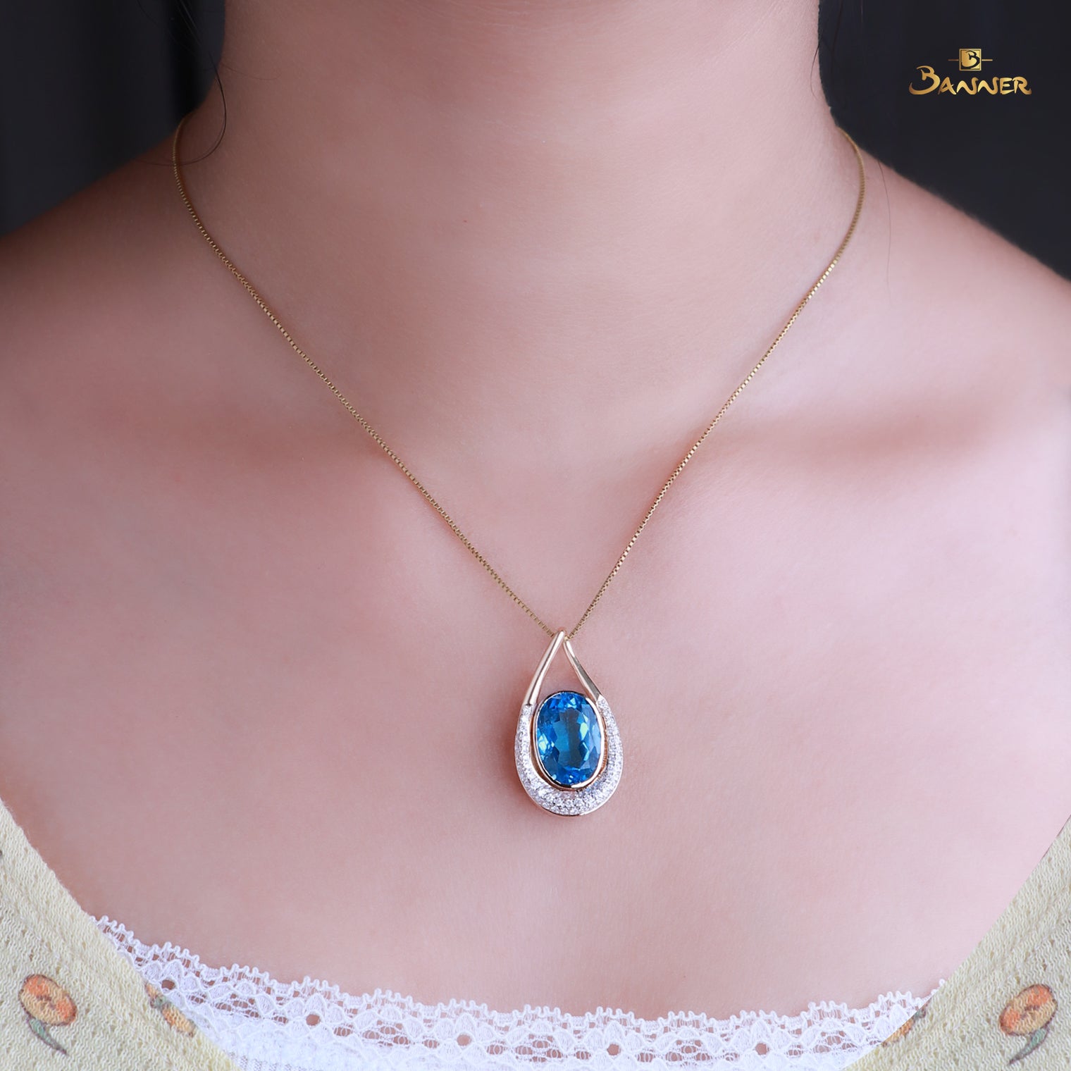 Blue Topaz and Diamond Droplet Pendant