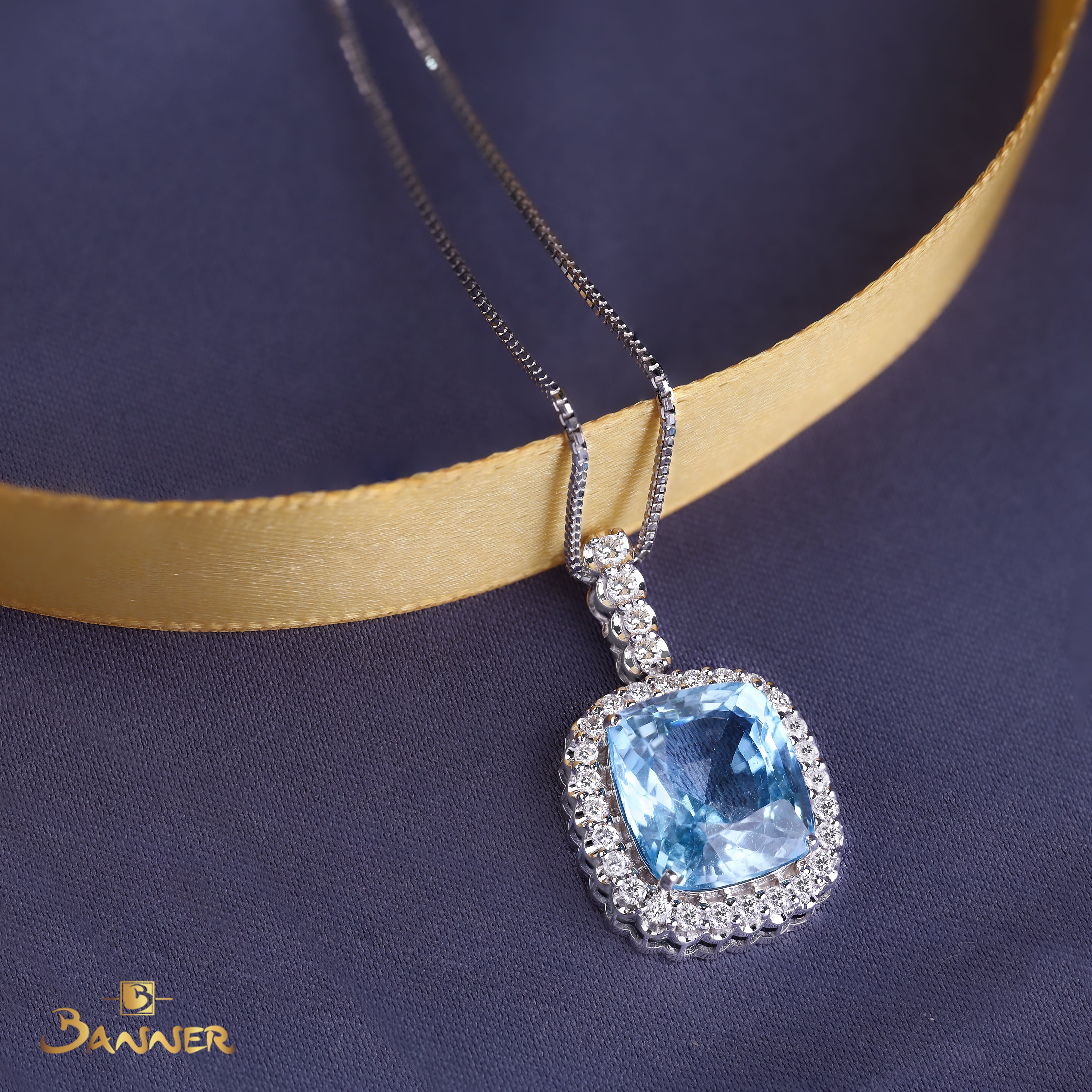 Blue Topaz and Diamond Halo Dangle Pendant