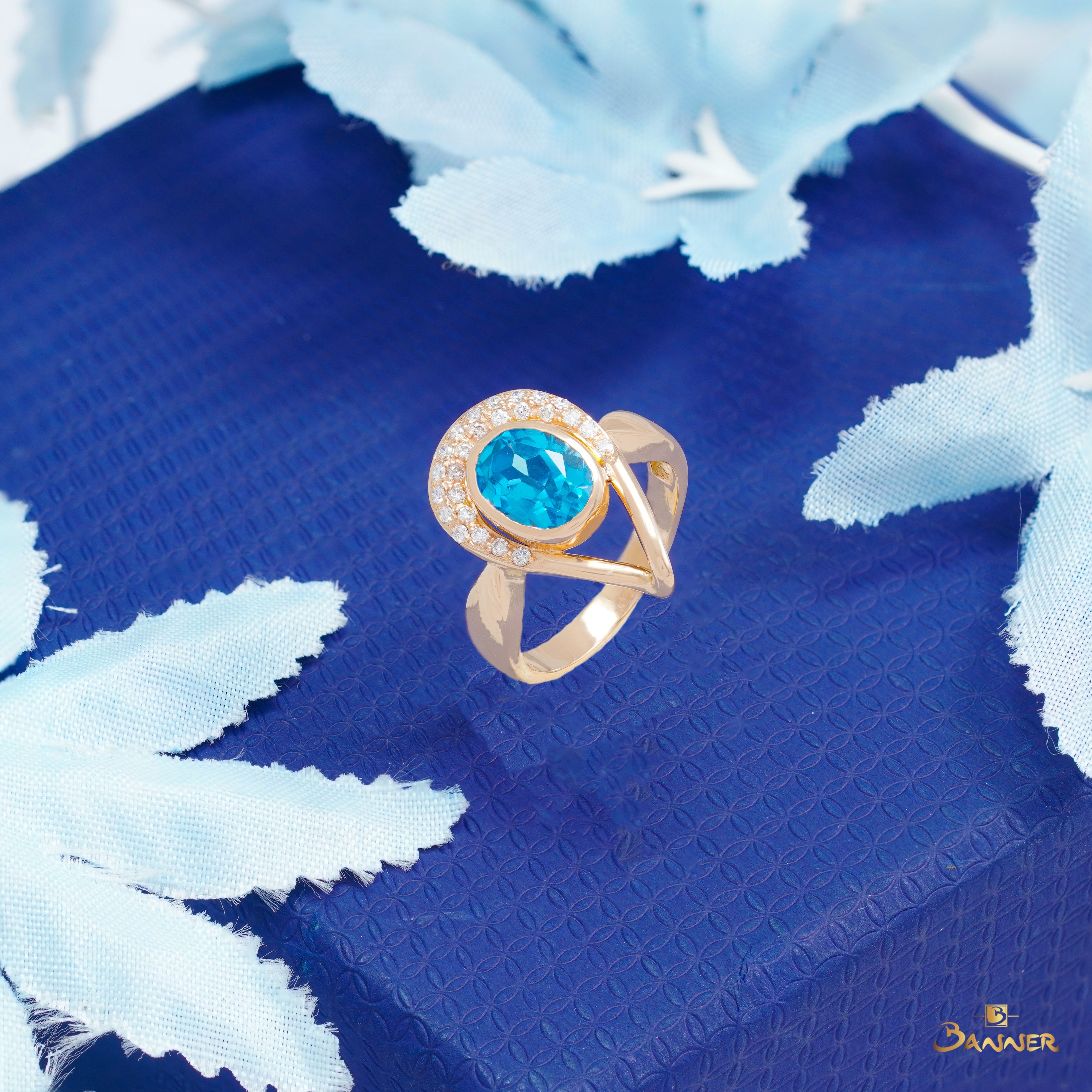Blue Topaz and Diamond Droplet Ring