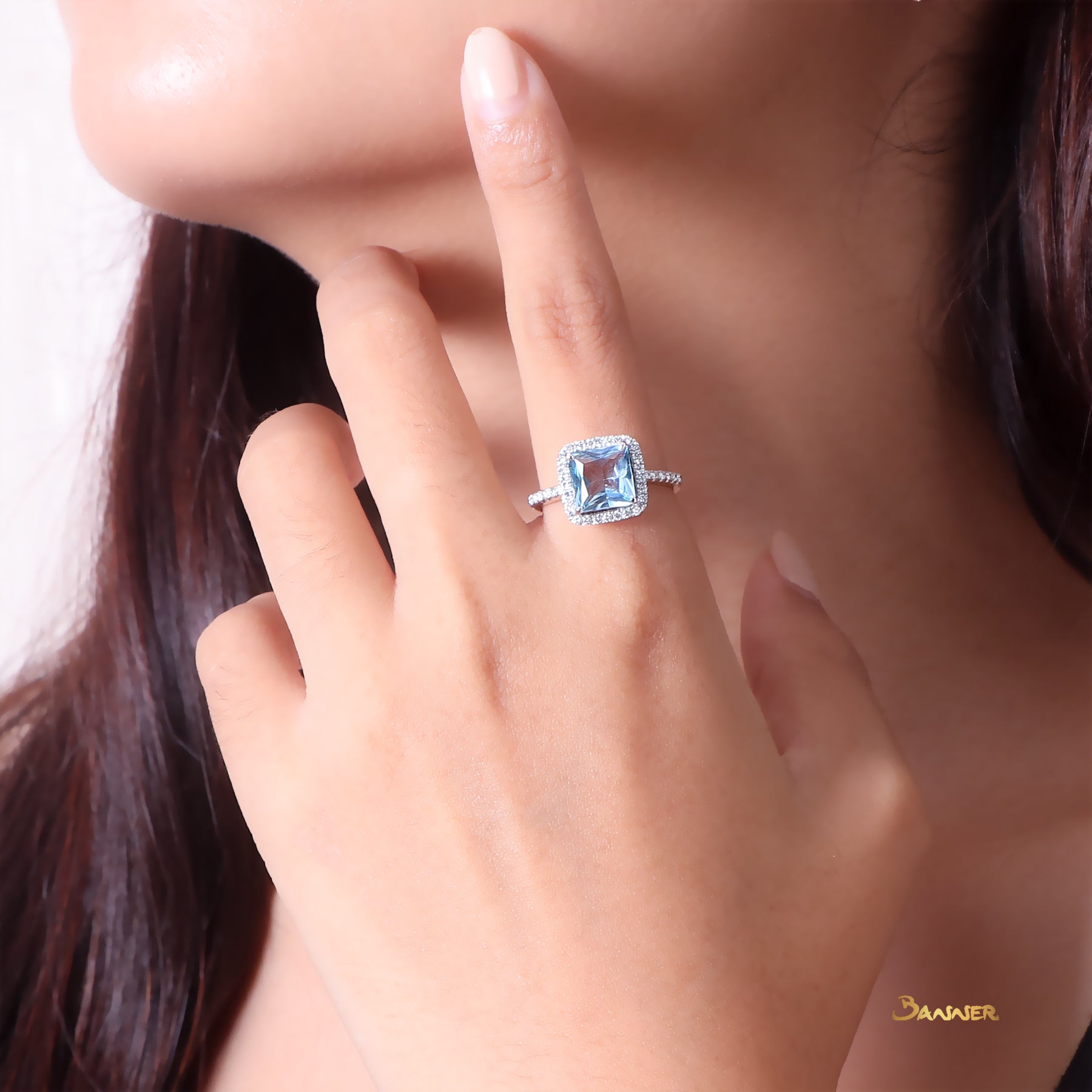 Blue Topaz and Diamond Halo Ring