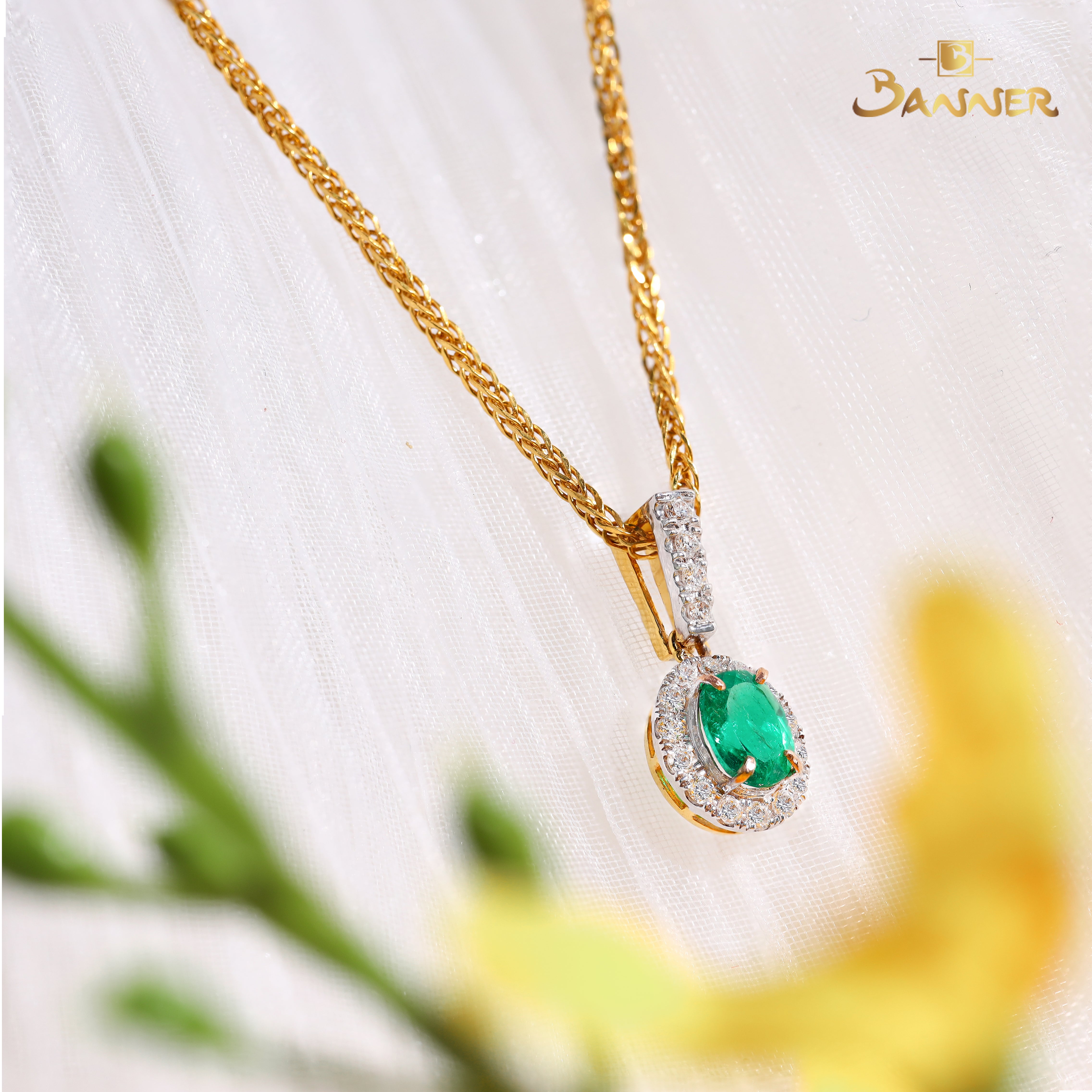 Columbian Emerald and Diamond Halo Pendant