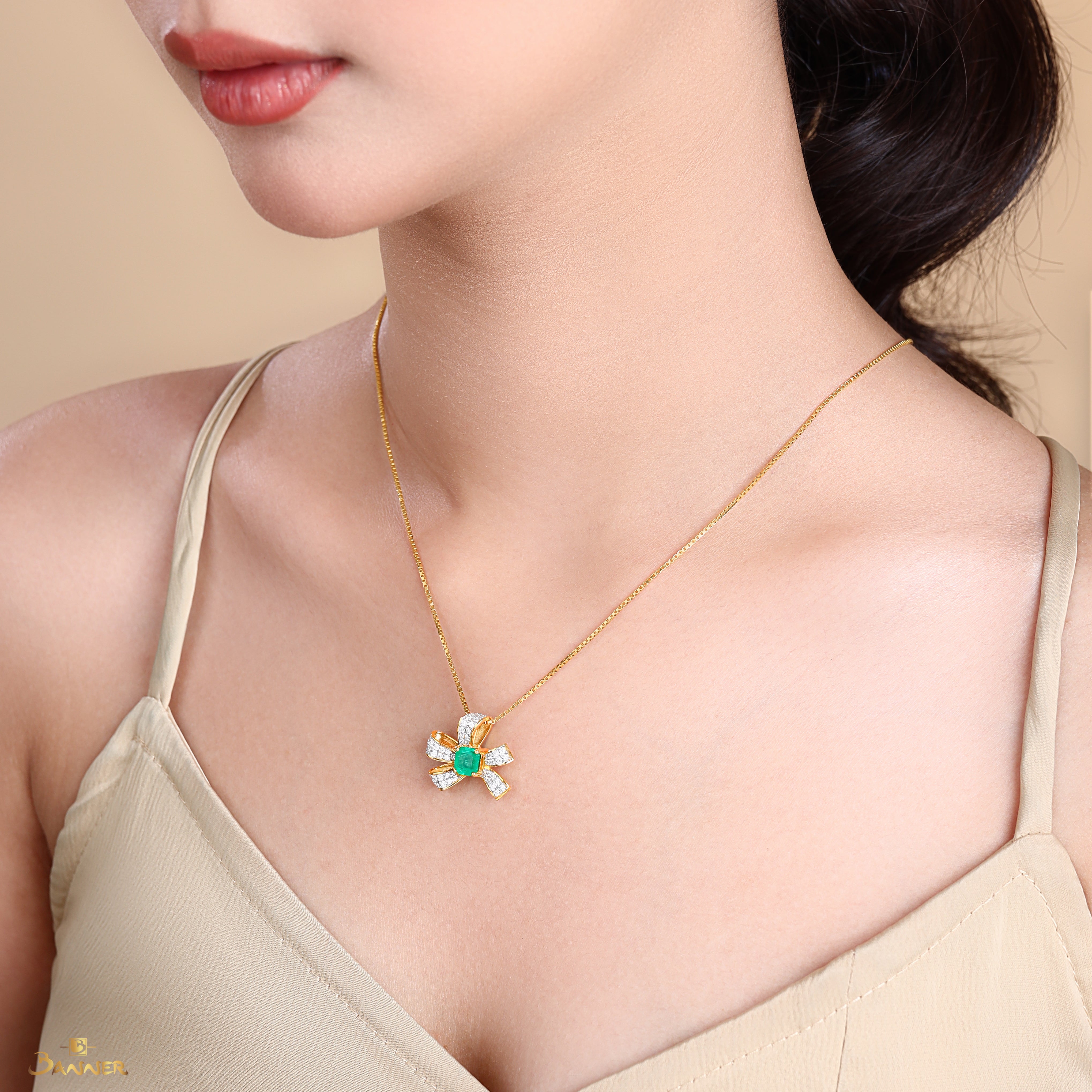 Columbia Emerald and Diamond Bow Pendant