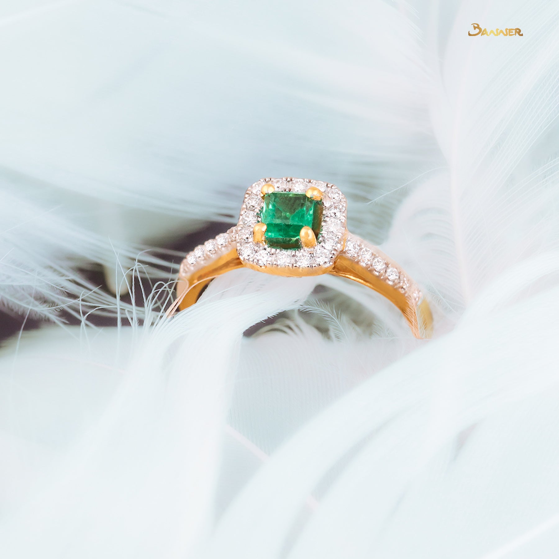 Emerald and Diamond Halo Set