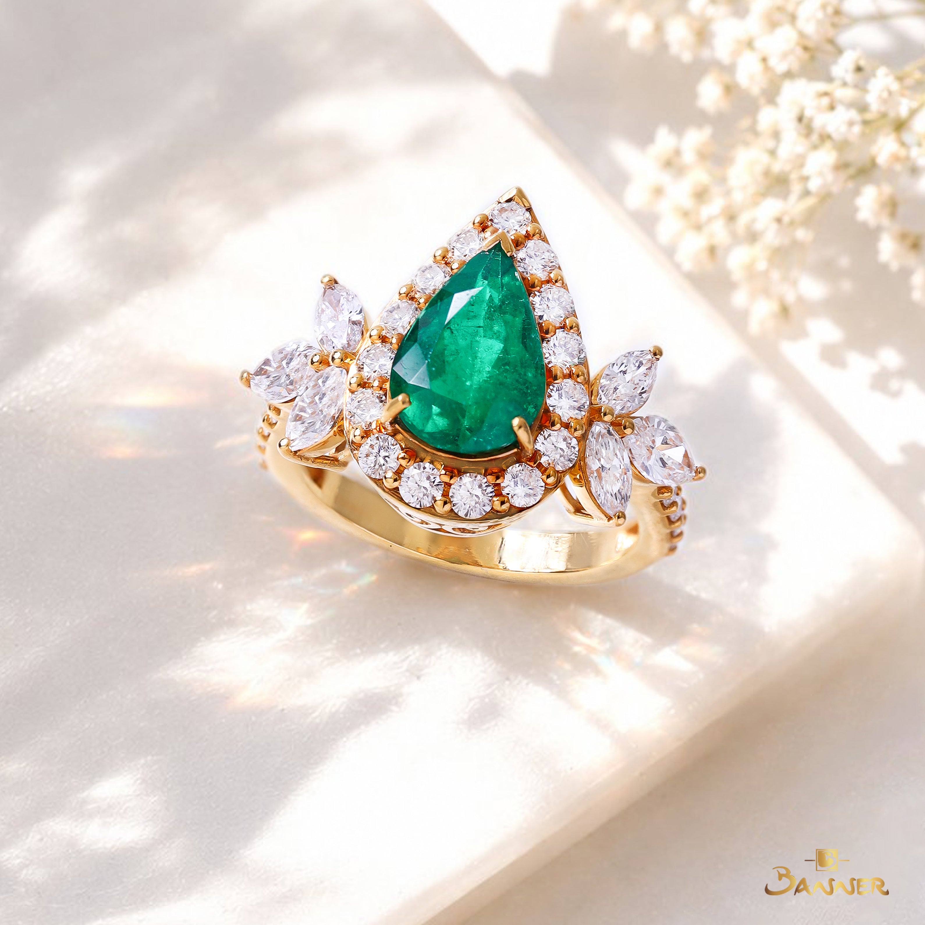 Columbia Emerald and Diamond Raindrop Halo Ring