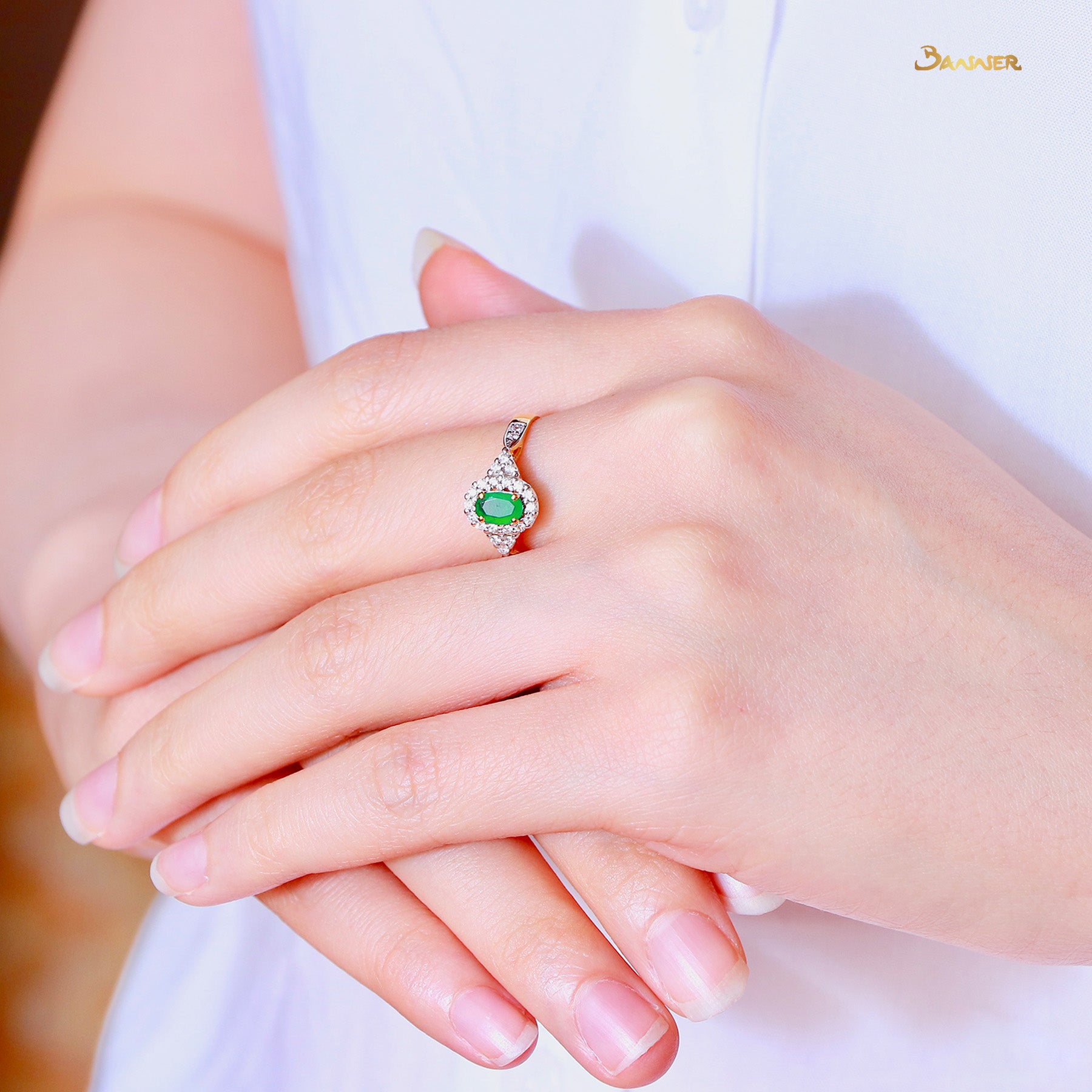 Emerald and Diamond Twisted Halo Ring