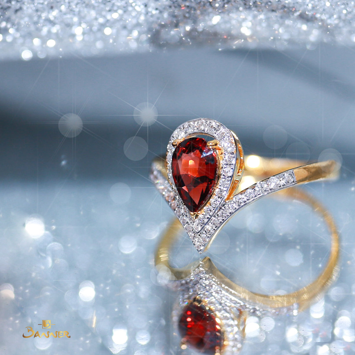 Pear-Shaped Garnet and Diamond Zest Ring