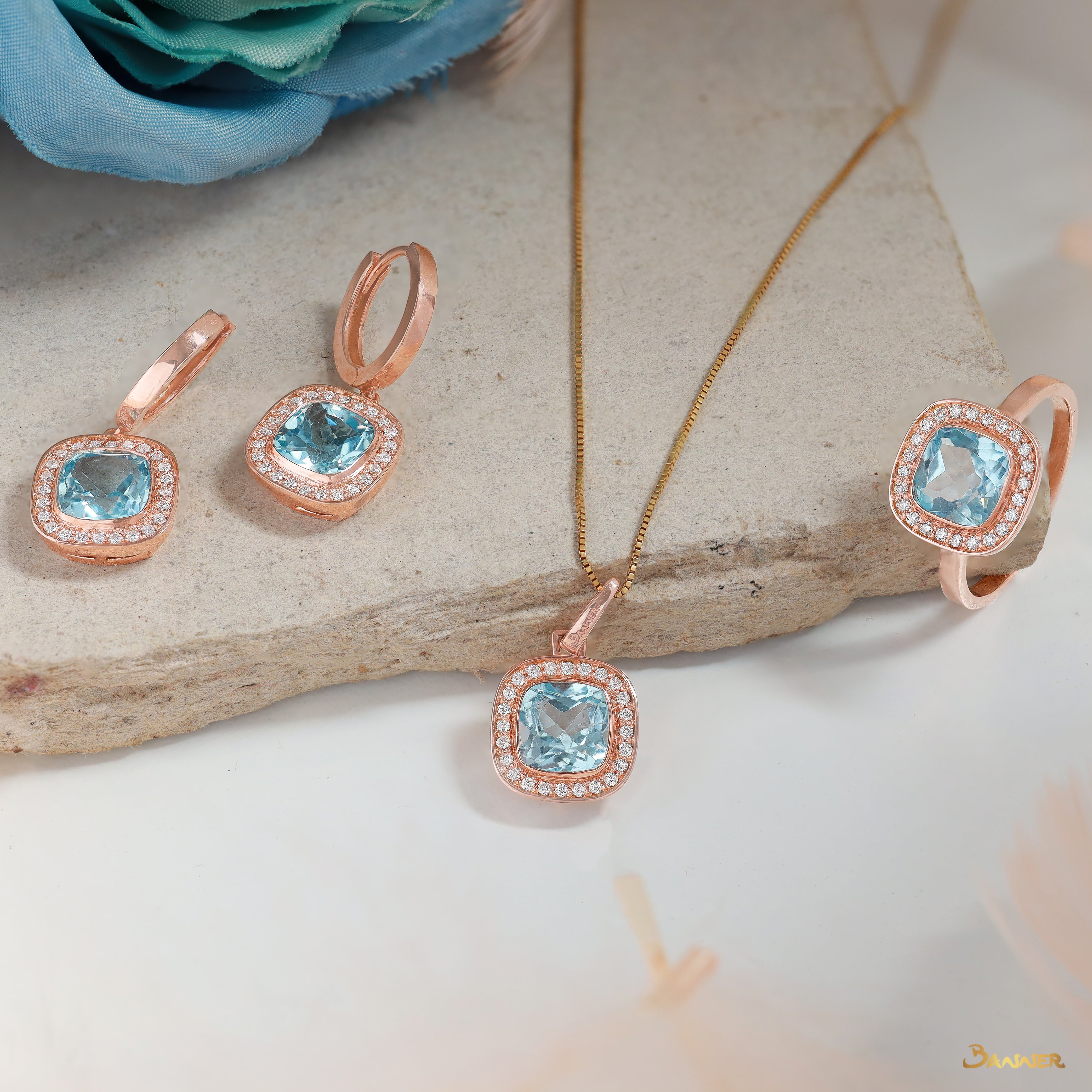 Blue Topaz and Diamond Halo Set