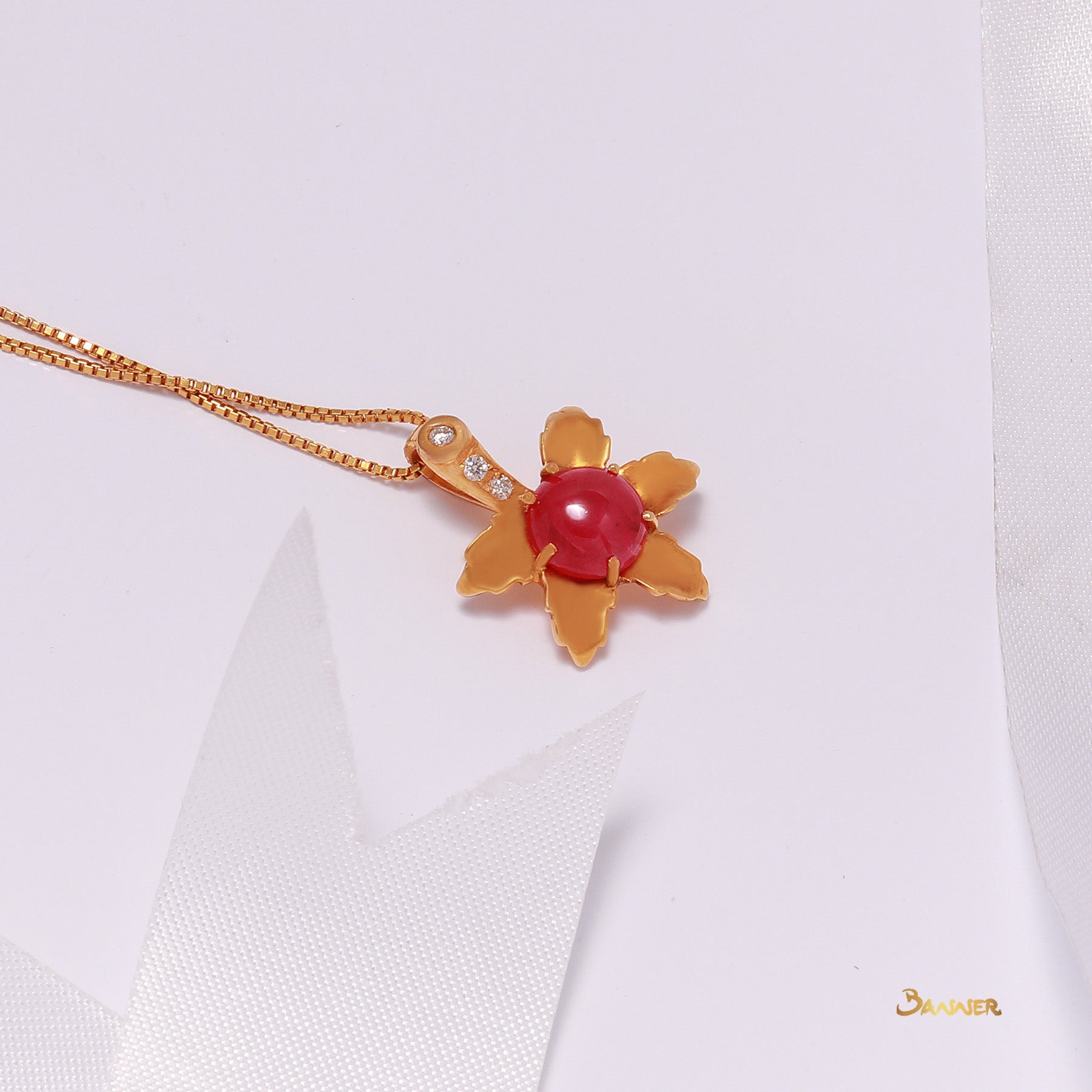 Ruby Cabochon and Diamond Flower Pendant