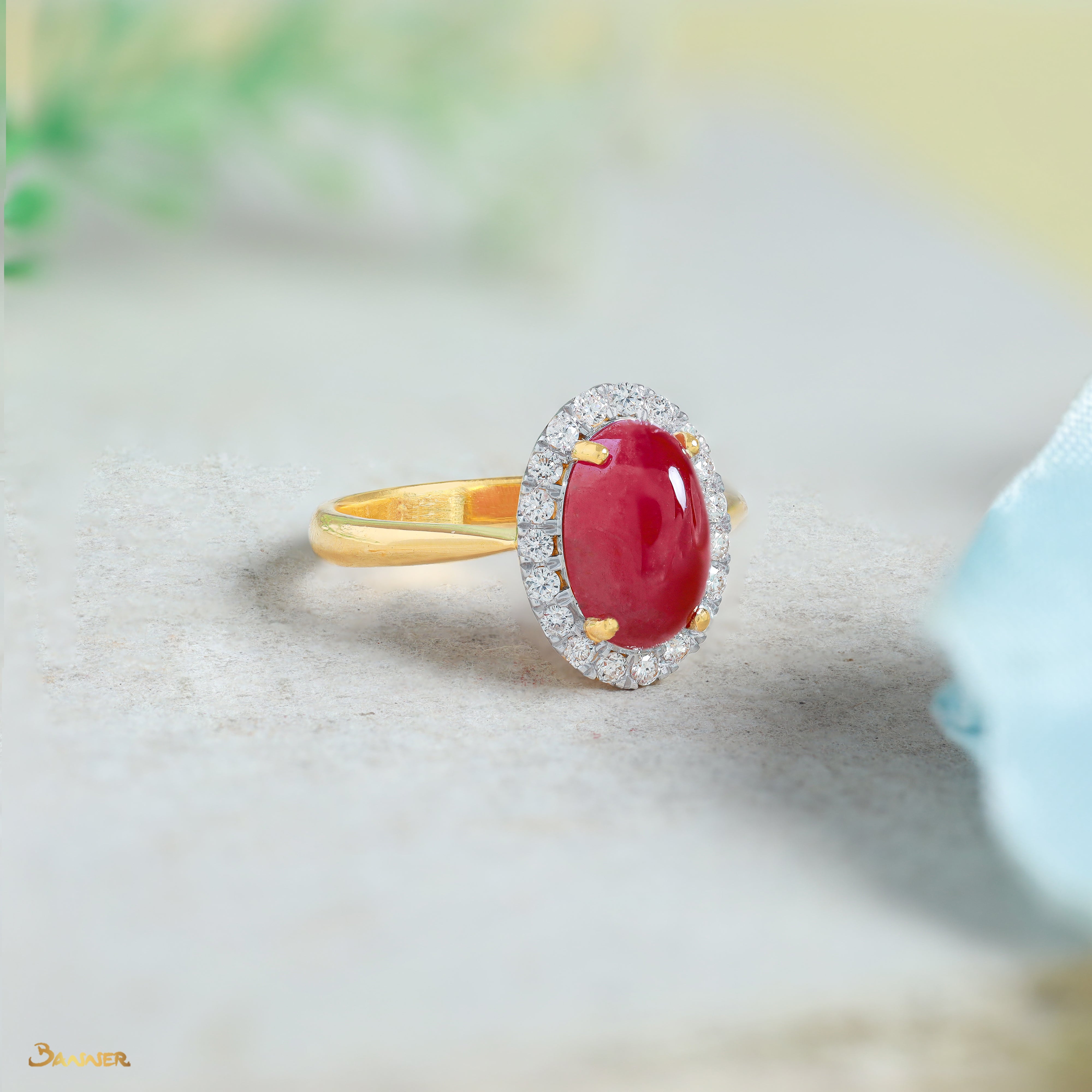 Ruby Cabochon and Diamond Halo Ring