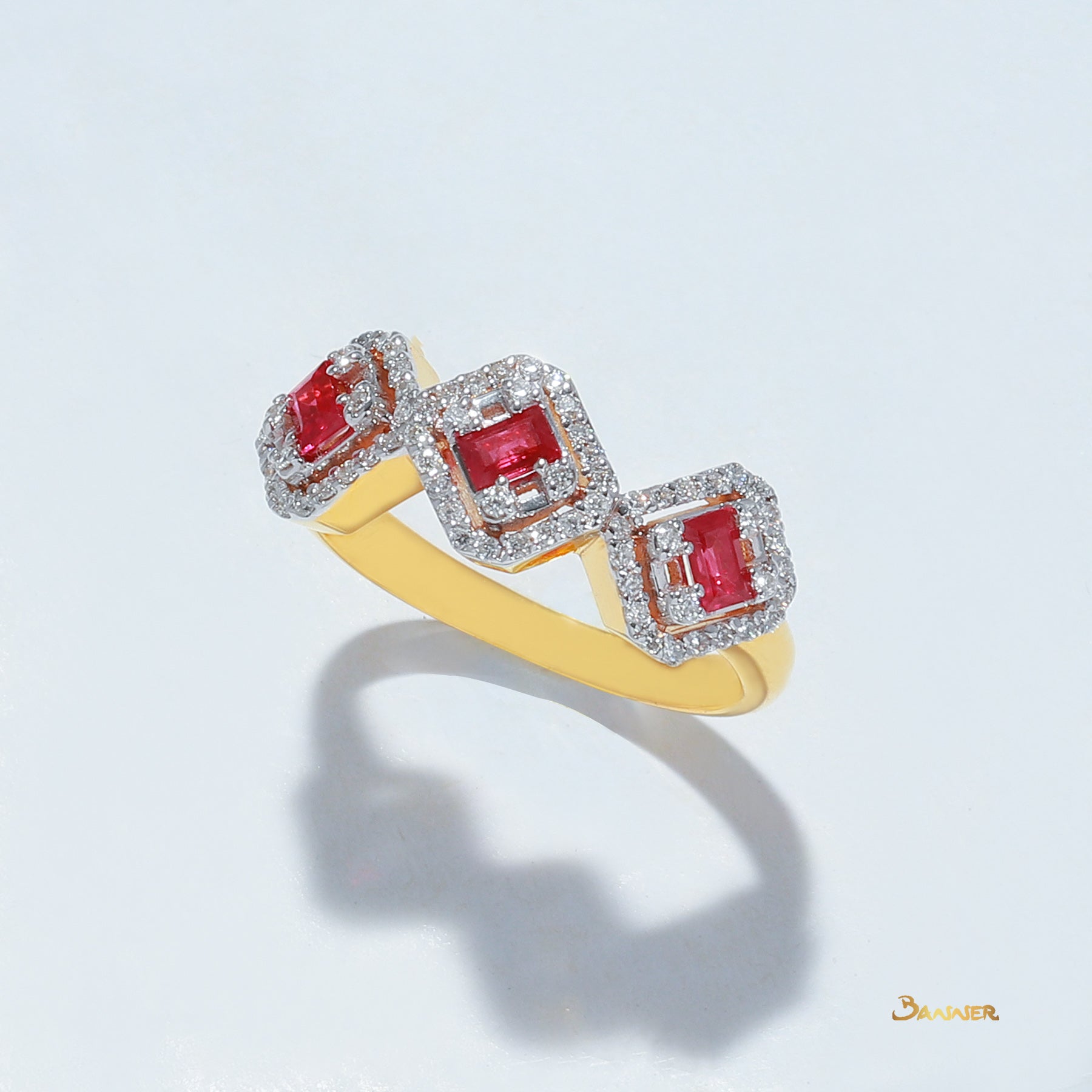 Emerald-cut 3 Rubies and Diamond Halo Ring