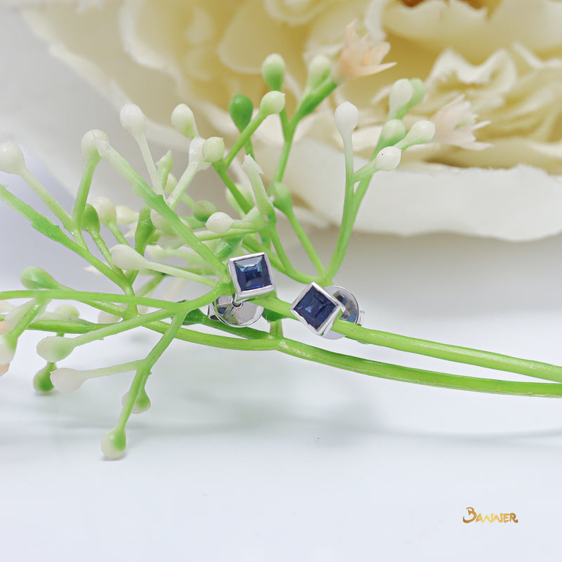 Emerald - Cut Sapphire Stud Earrings