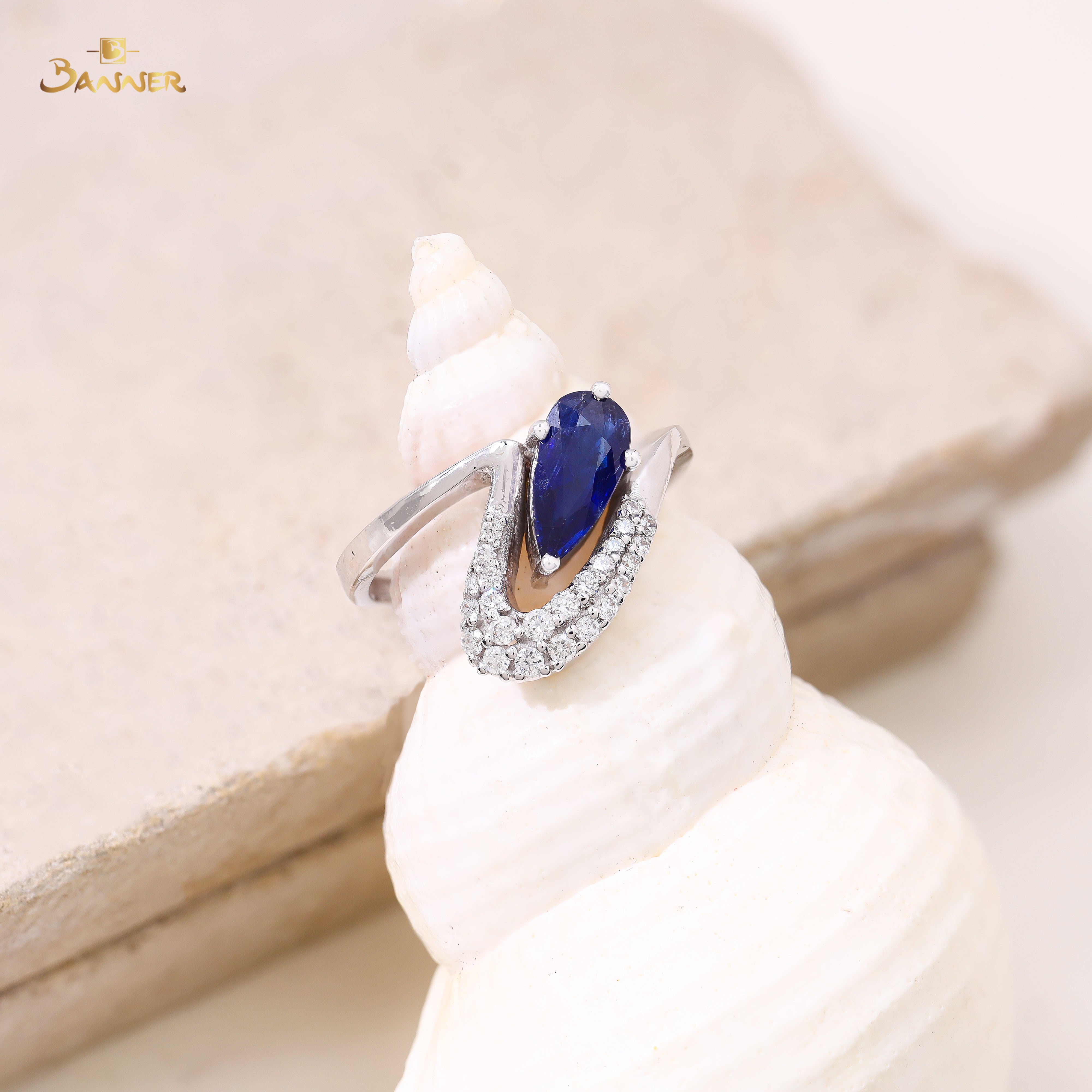 Sapphire and Diamond Swirl Ring