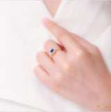 Emerald-cut Sapphire and Diamond Halo Ring