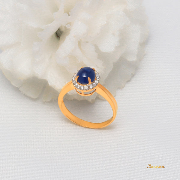 Sapphire Cabochon and Diamond Halo Ring