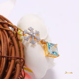 Blue Topaz and Diamond Snowflake Pendant