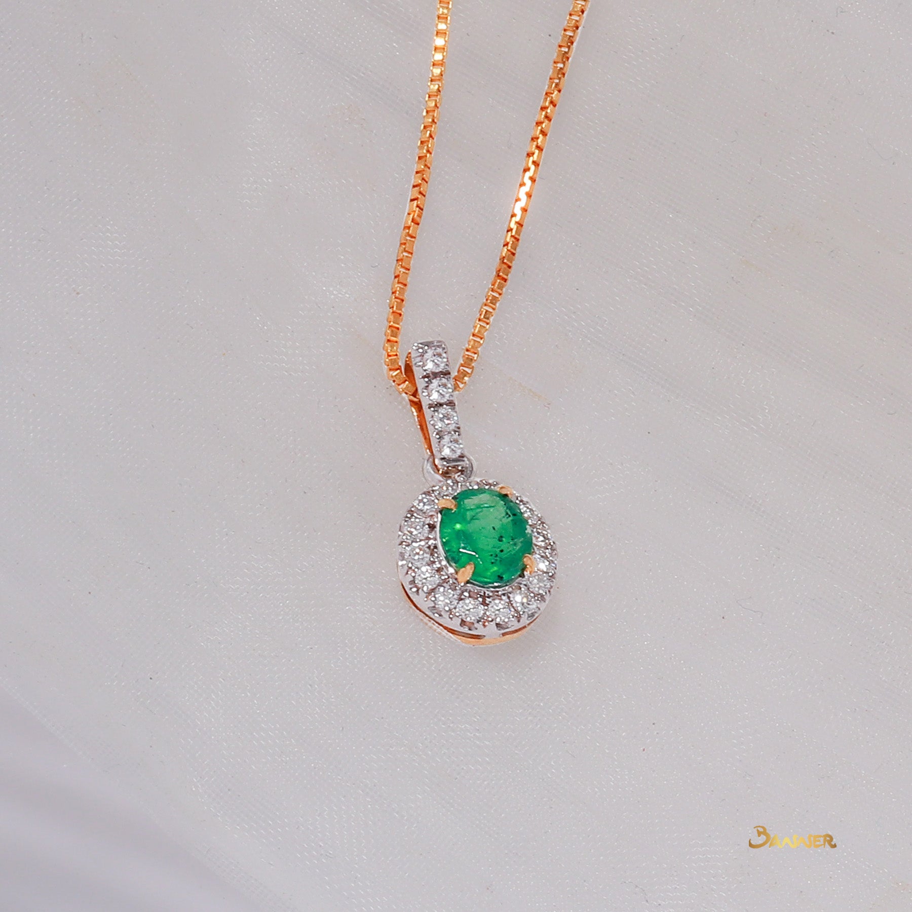 Emerald and Diamond Halo Pendant