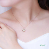 White Jade and 18K Rose Gold Pendant