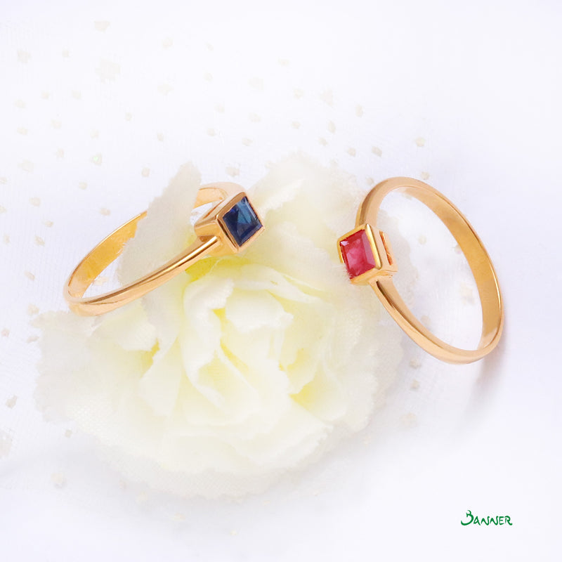 Emerald-cut Sapphire Bezel Set Ring