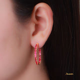 Ruby Huggie Earrings