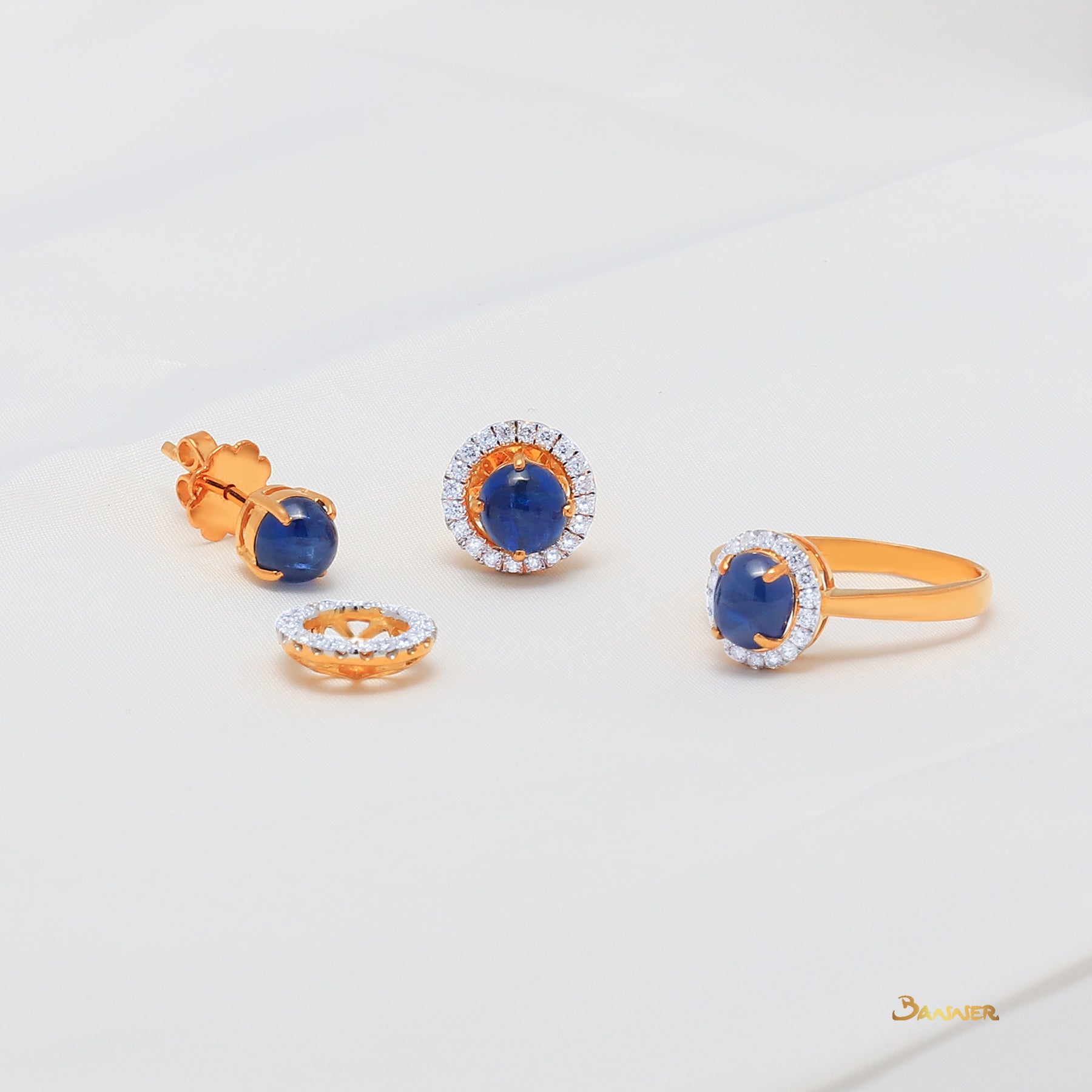 Sapphire Cabochon and Diamond Halo Set