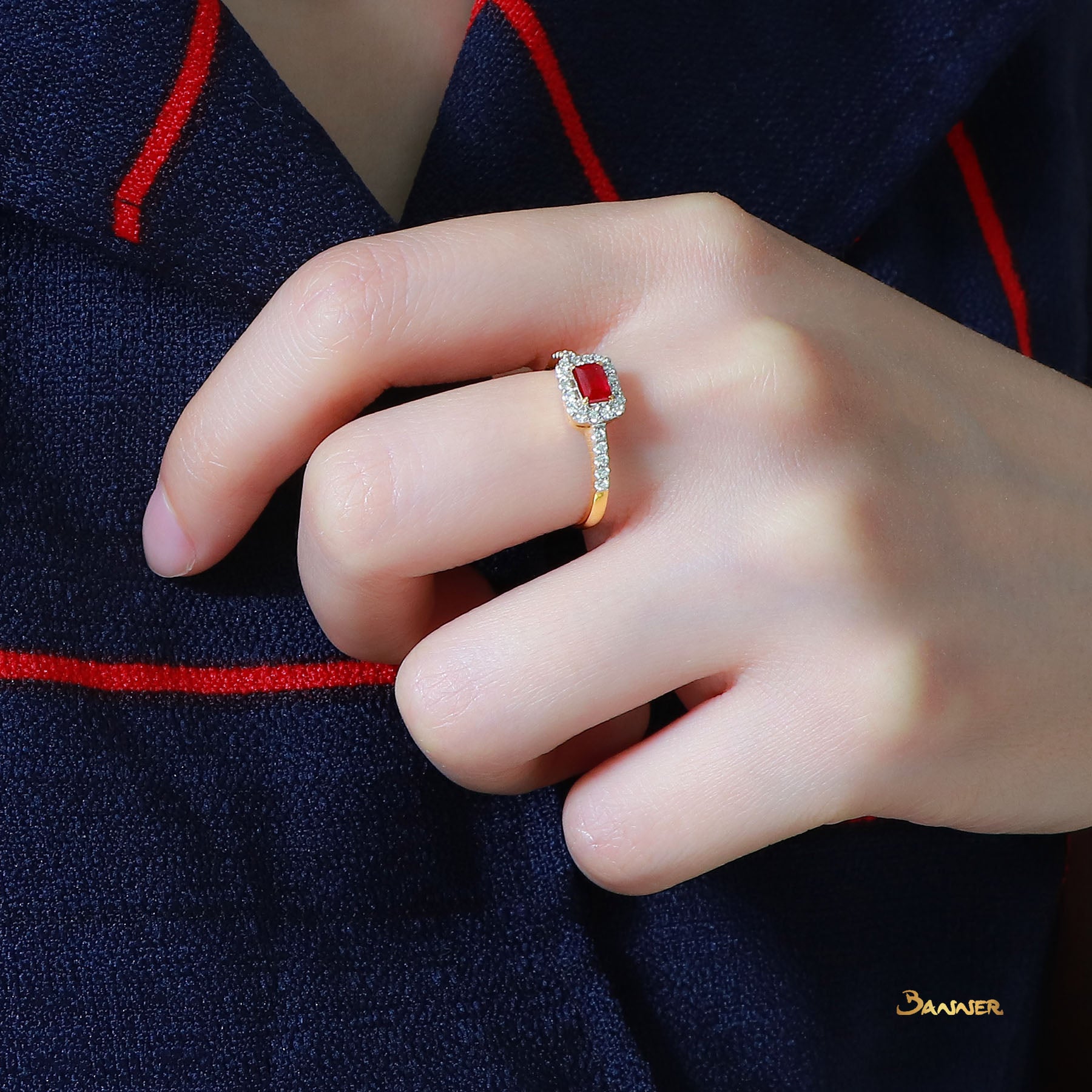 Emerald-cut Ruby and Diamond 2-Step Halo Ring