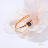 Emerald-cut Sapphire Bezel Set Ring